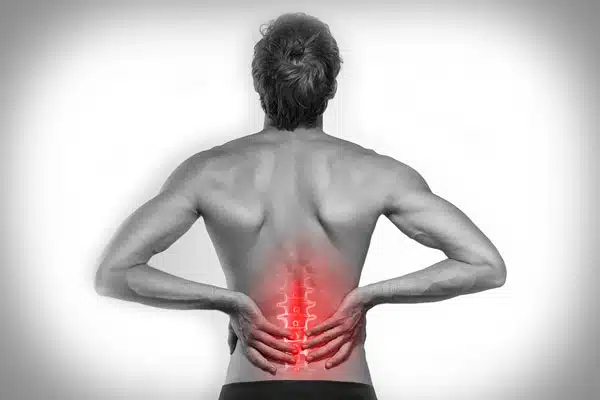 Black and white photo with back pain highlighted