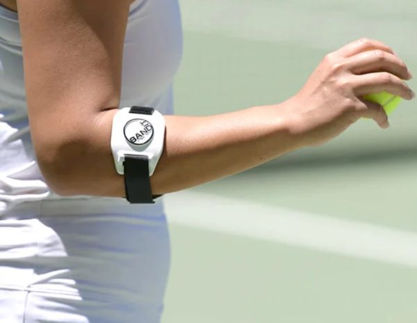 tennis player with bandit elbow strap